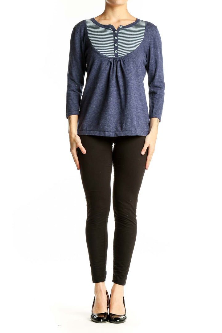 Front view of Boden navy knit top with striped yoke and Henley neckline