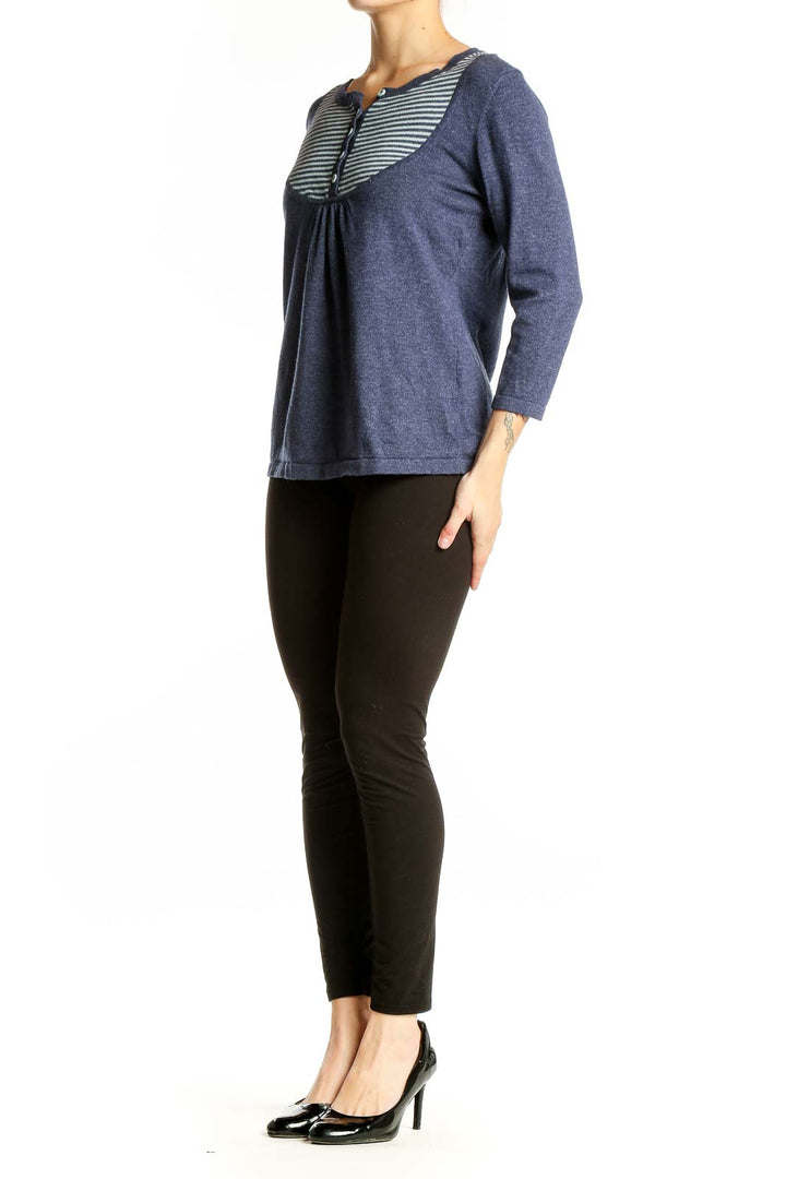 Front view of Boden navy knit top with striped yoke and Henley neckline
