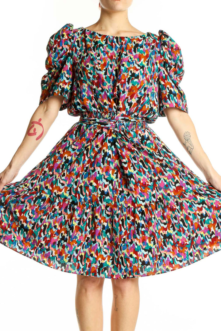 Front view of multicolor abstract print puff sleeve dress by London Times