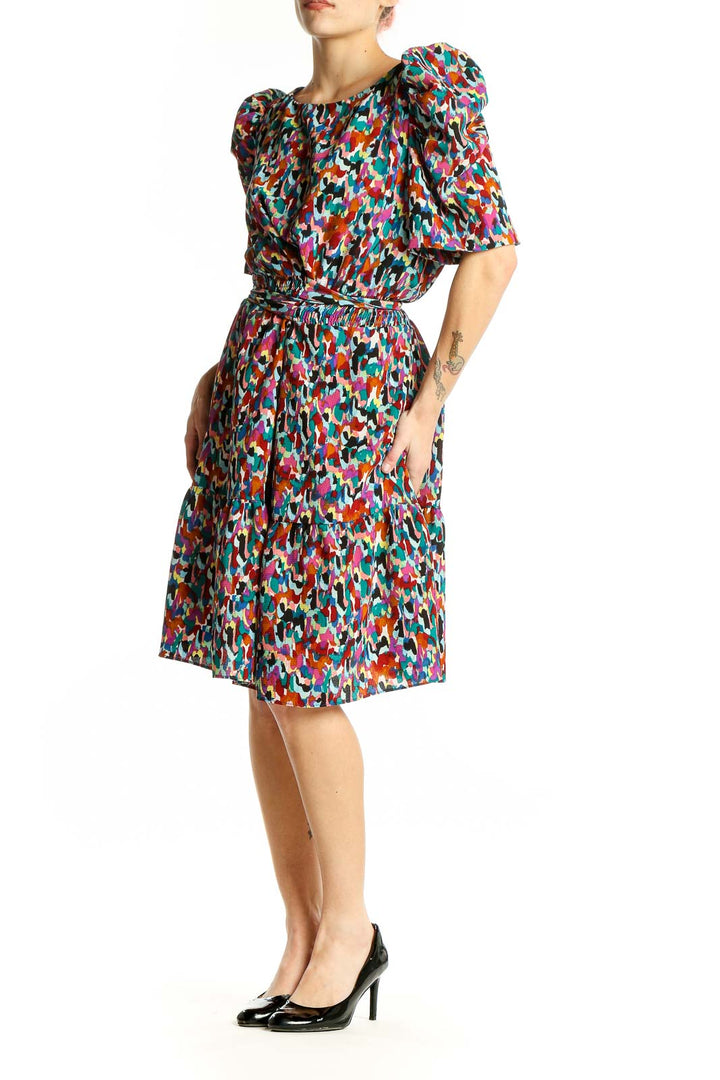 Front view of multicolor abstract print puff sleeve dress by London Times