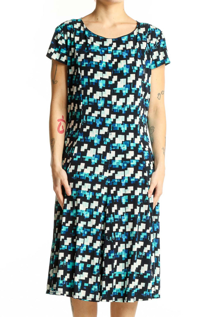 Front view of Eliza J blue geometric print A-line dress