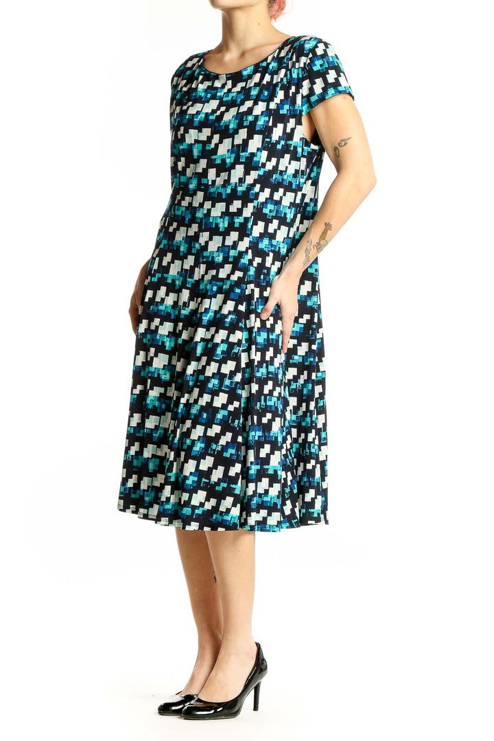 Front view of Eliza J blue geometric print A-line dress
