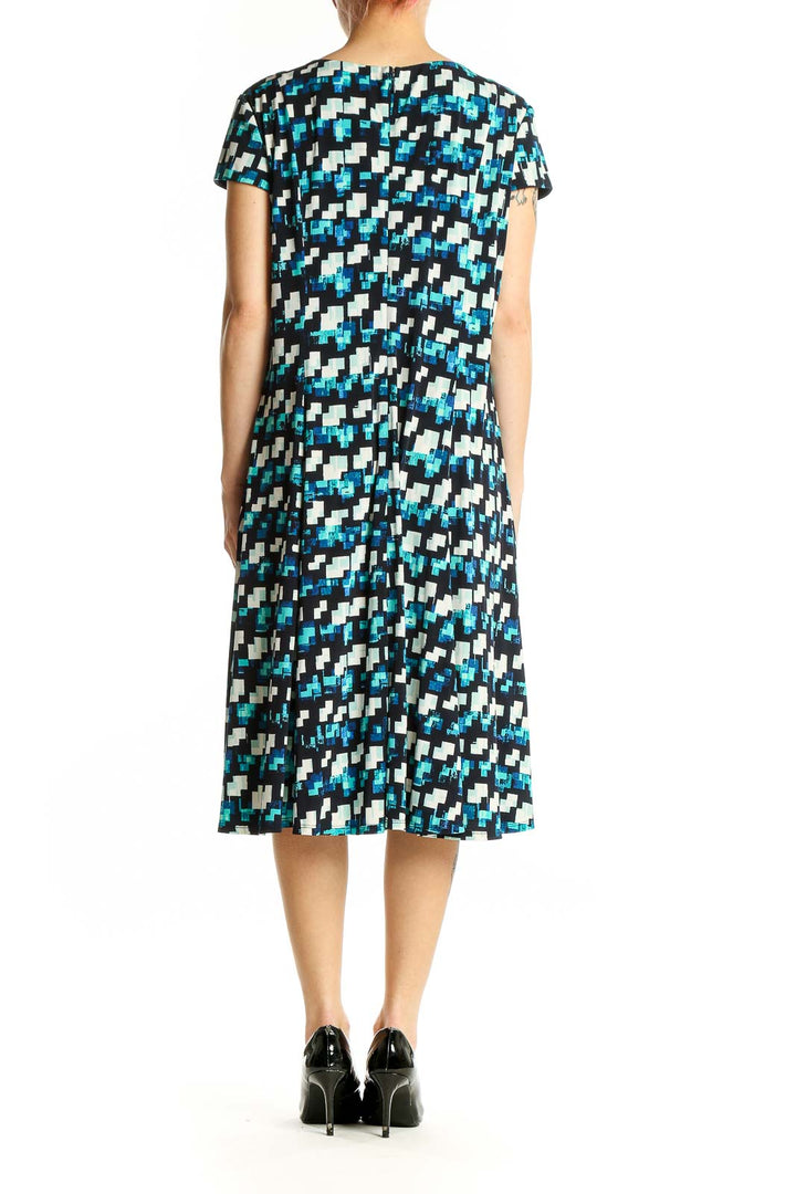 Back view of Eliza J blue geometric print A-line dress