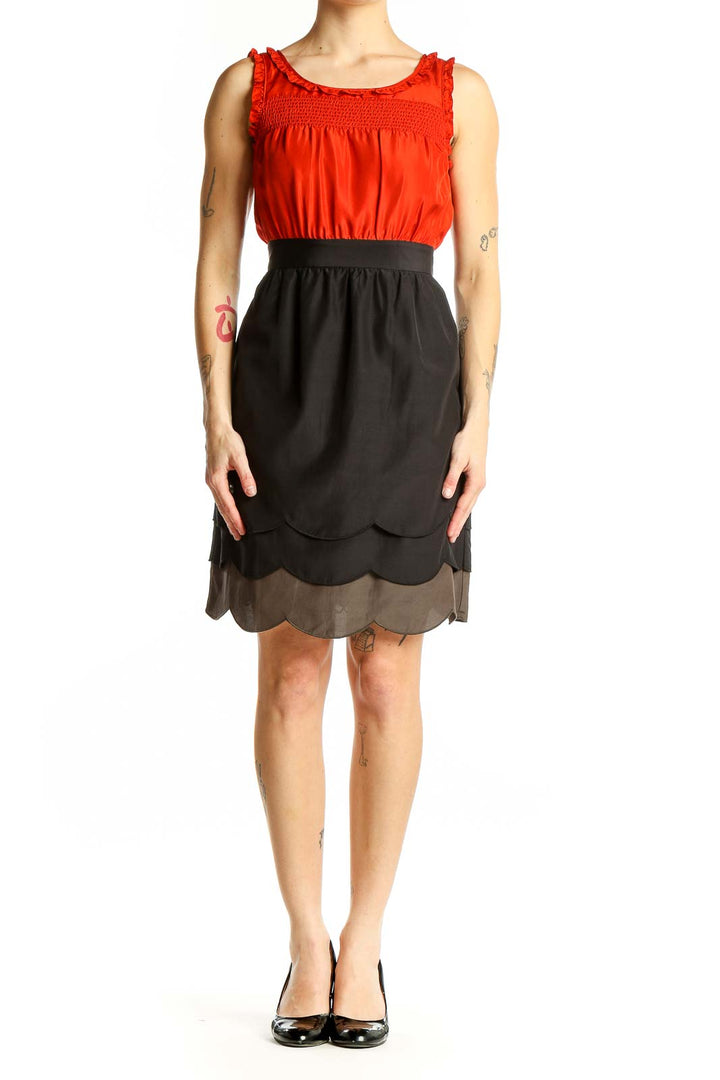 Front view of Maeve red silk dress with ruched bodice and scalloped skirt