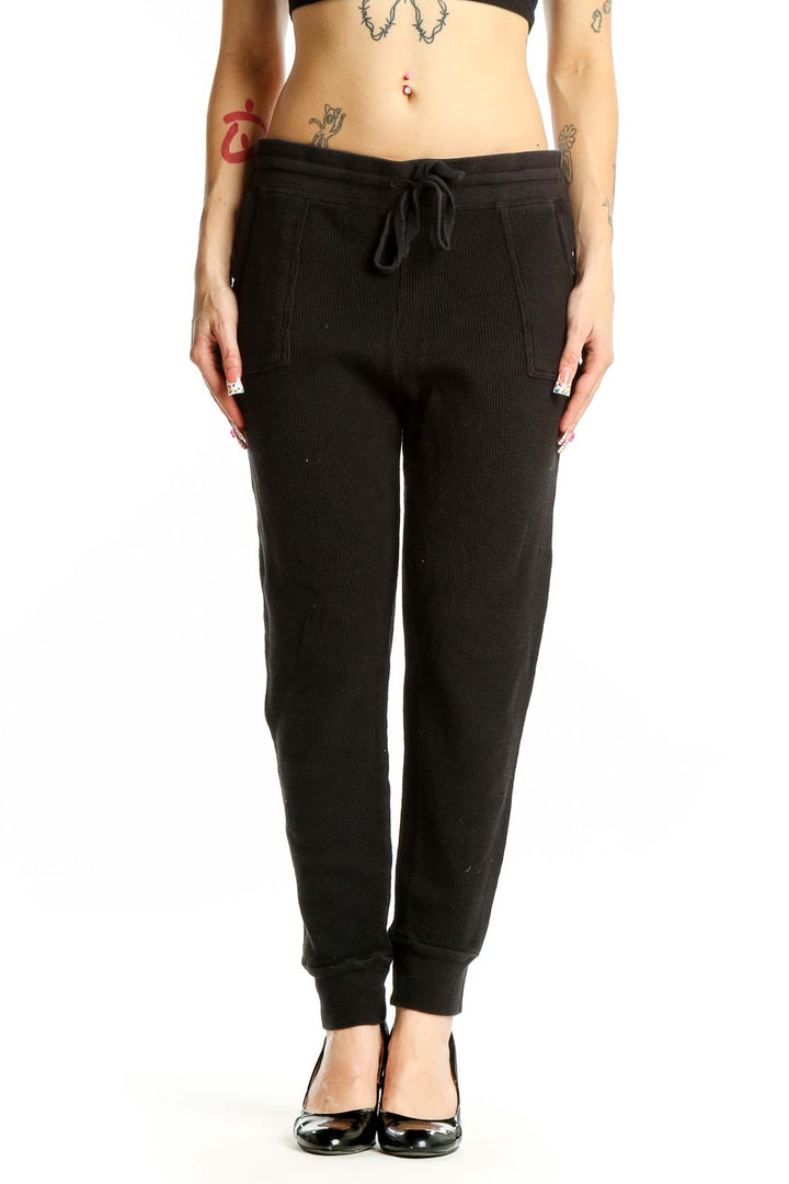 Front view of black Splendid joggers with drawstring waist