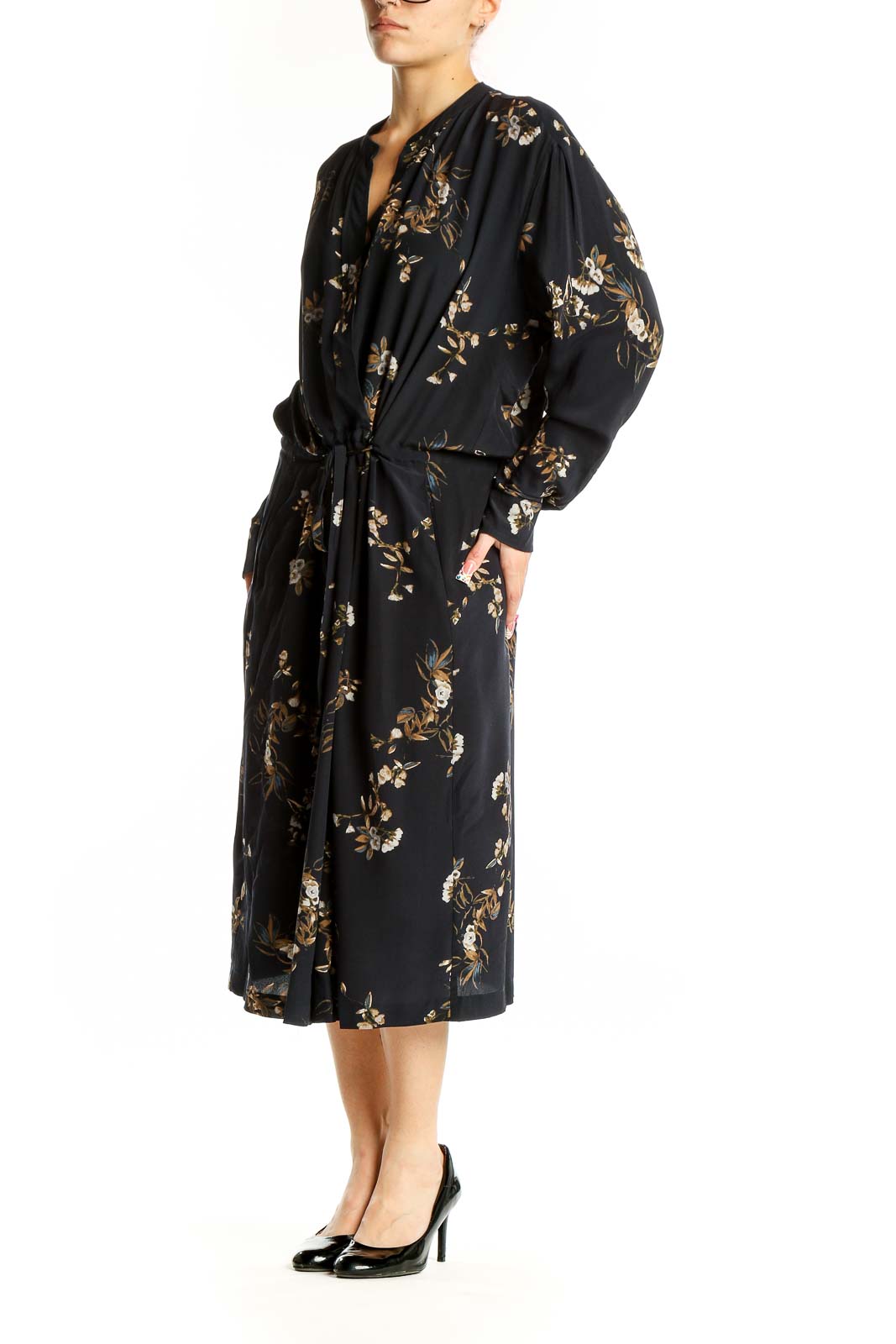 Front view of Vince black silk midi dress with gold floral print and tie waist