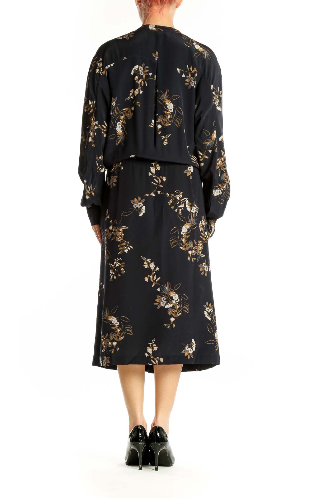 Side view of Vince black silk midi dress showing long sleeves and floral pattern