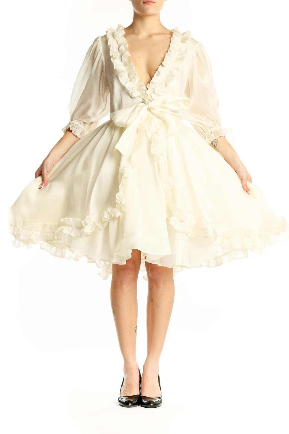 Front view of Selkie Collection ivory silk wrap dress with ruffled neckline and voluminous sleeves