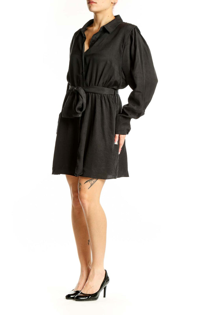 Front view of black Zara belted shirt dress on model