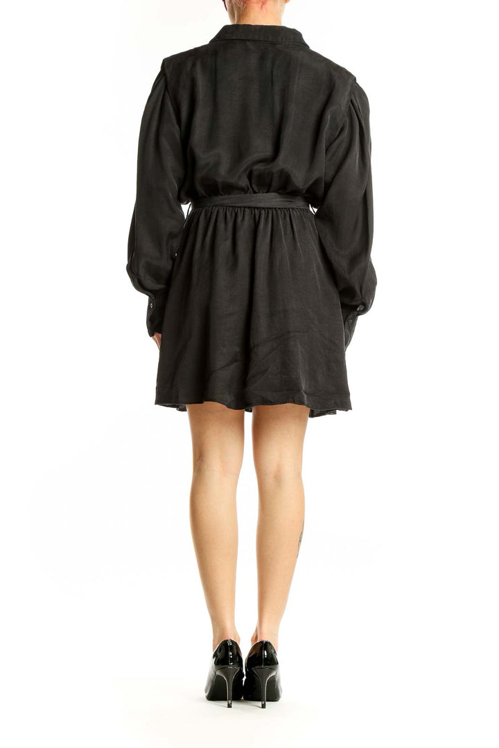 Back view of black Zara belted shirt dress on model