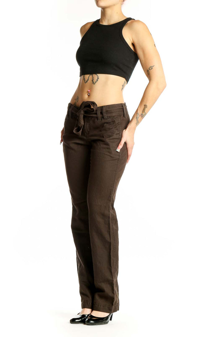 Front view of brown Banana Republic pants with belted waist