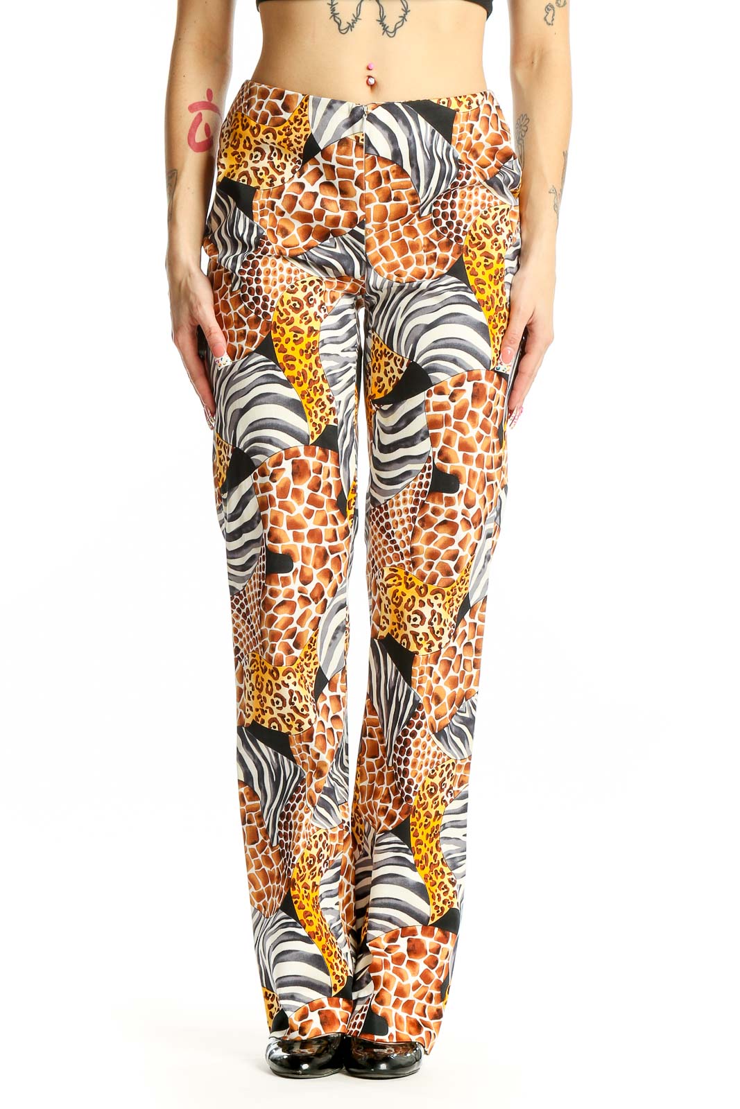 Front view of Cache animal print wide-leg pants with giraffe, leopard, and zebra patterns