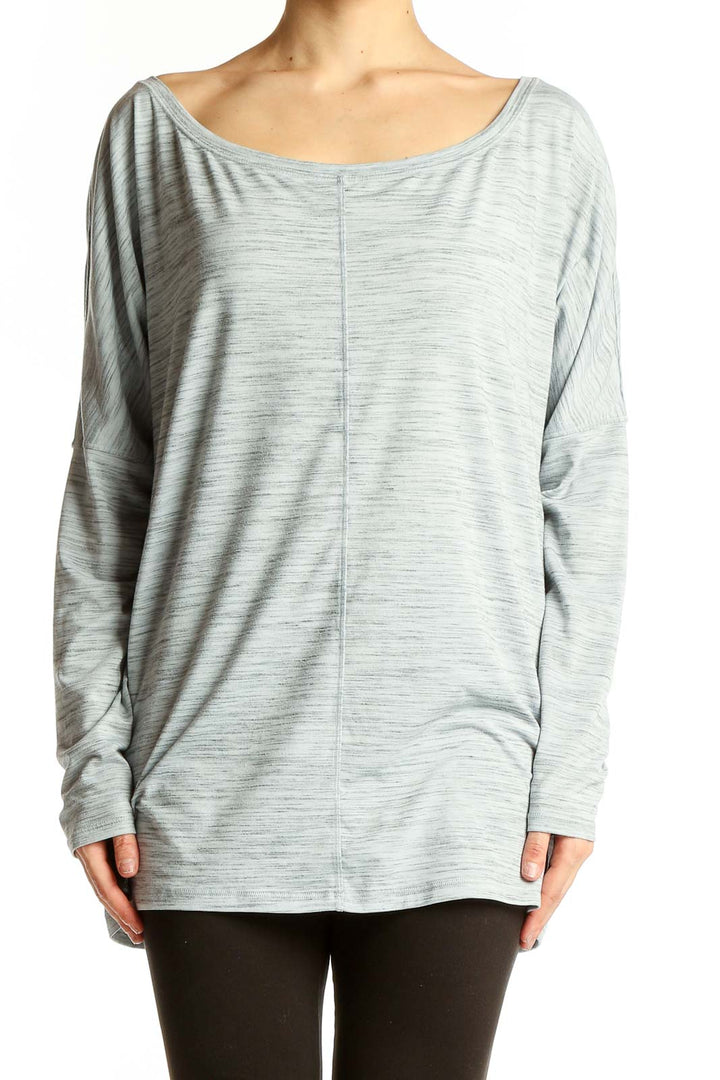 Front view of light gray oversized Athleta activewear top