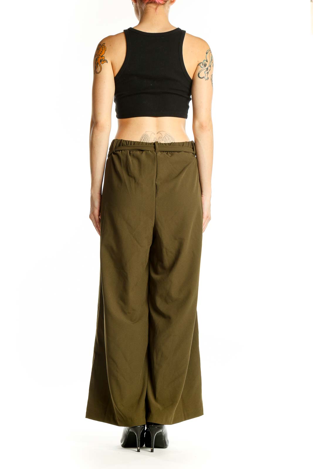Side view of model wearing Loveappella olive wide-leg pants with black top