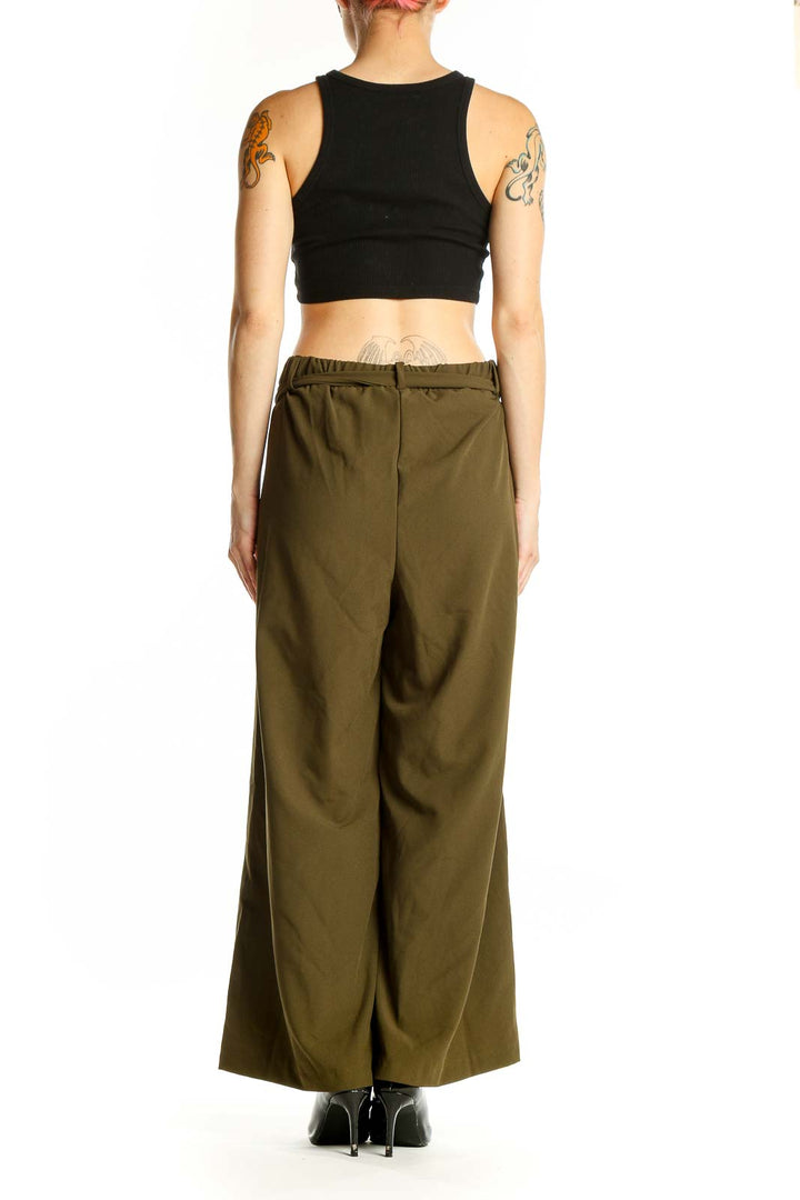 Side view of model wearing Loveappella olive wide-leg pants with black top