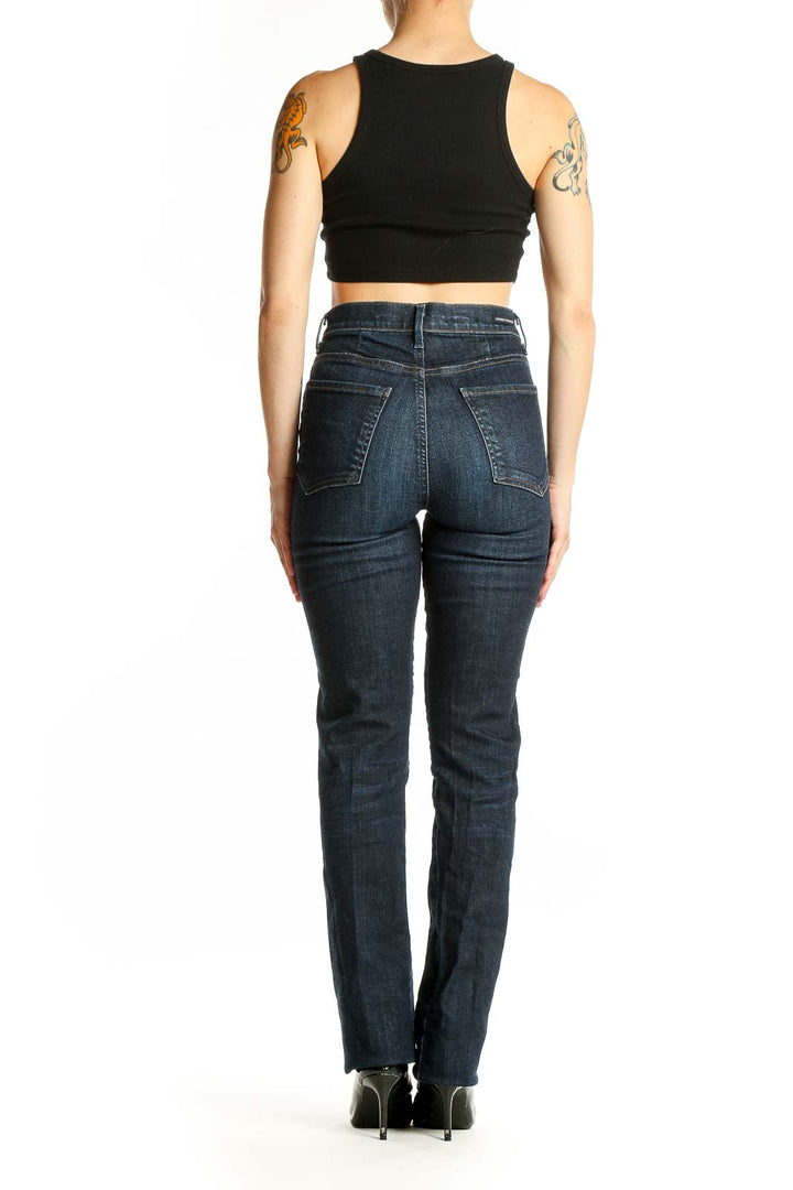 Back view of Citizens of Humanity dark blue straight leg jeans on model