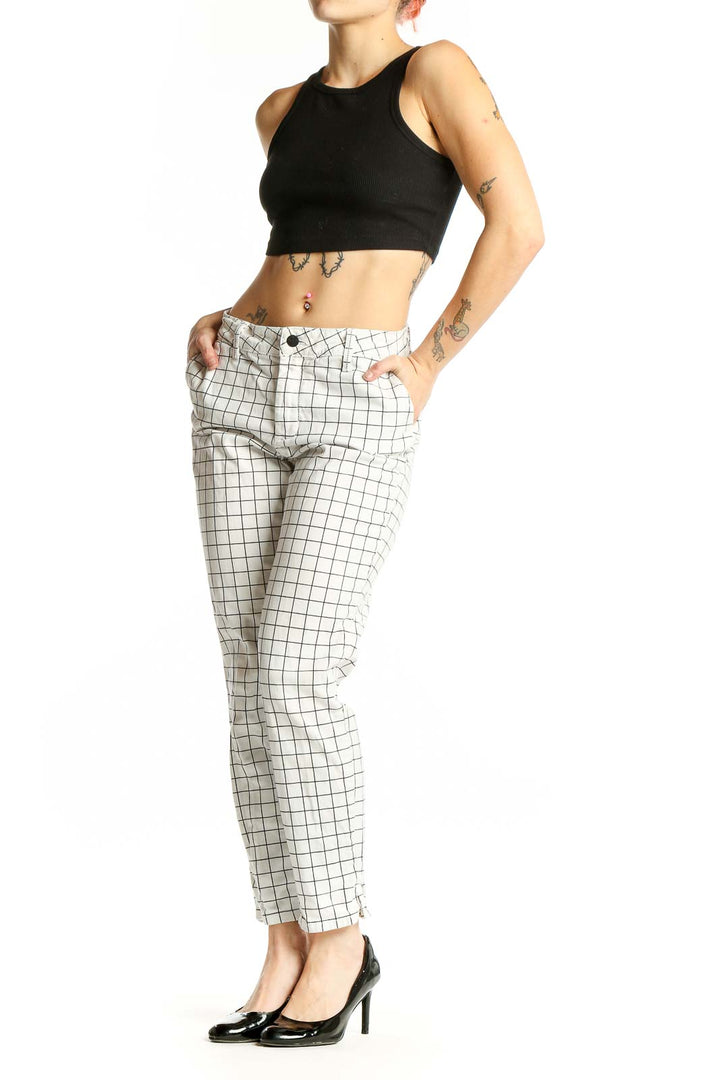 Front view of NYDJ white grid pattern denim pants