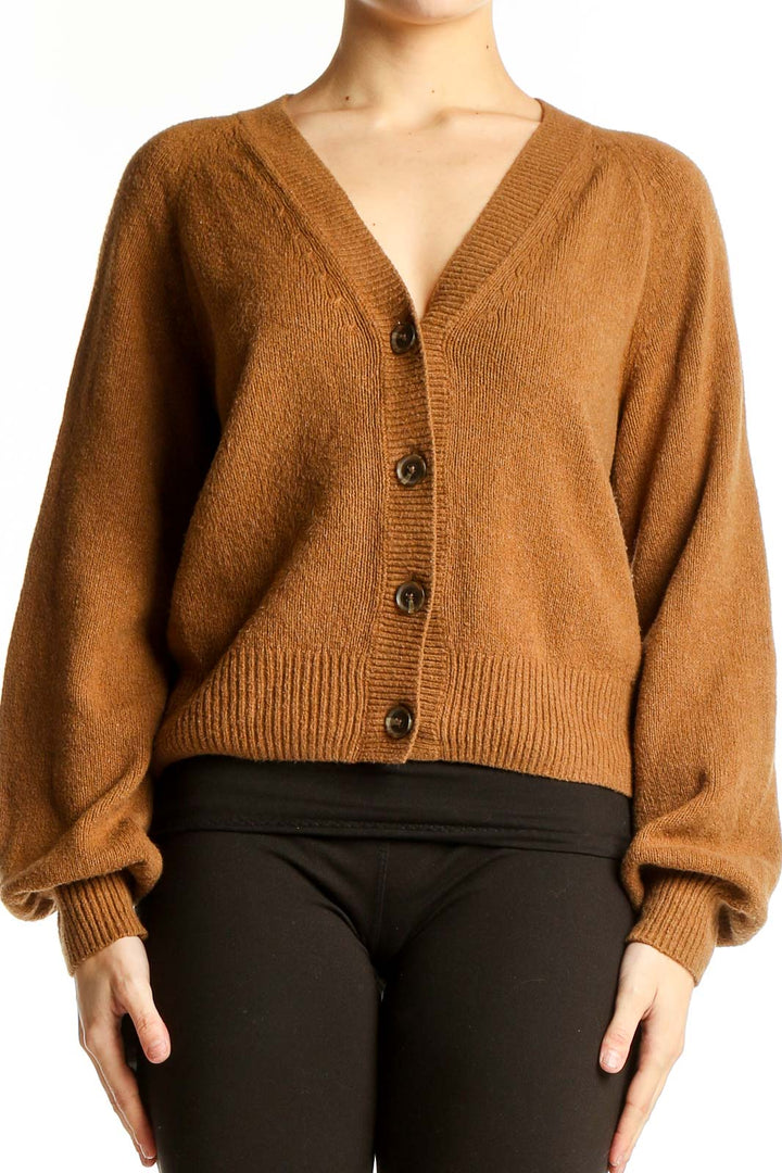 Front view of camel Gap cardigan with V-neck and button-up design