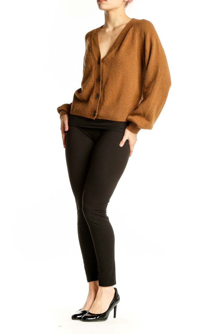 Front view of camel Gap cardigan with V-neck and button-up design