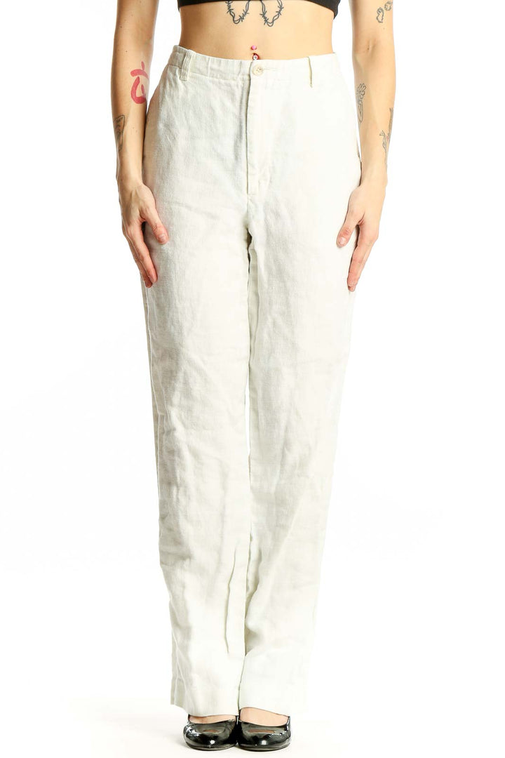 Front view of Banana Republic white linen wide-leg trousers on model