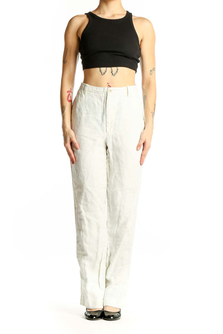 Front view of Banana Republic white linen wide-leg trousers on model
