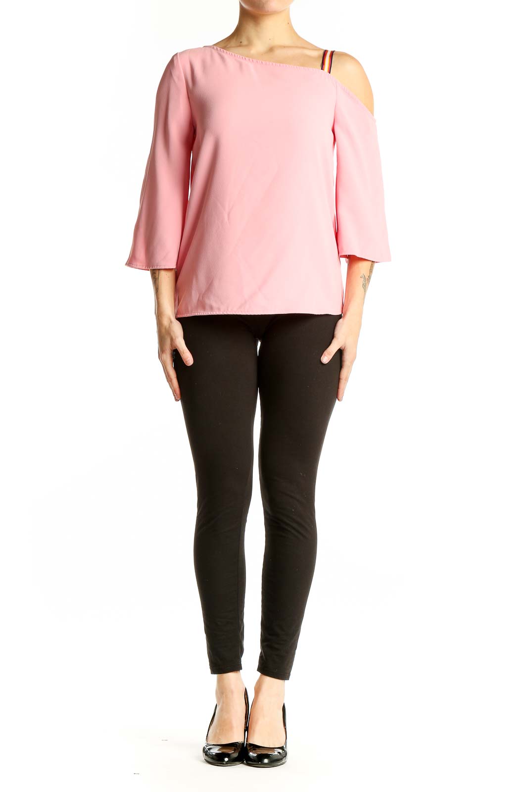 Front view of pink off-shoulder blouse by Trina Turk with asymmetrical neckline