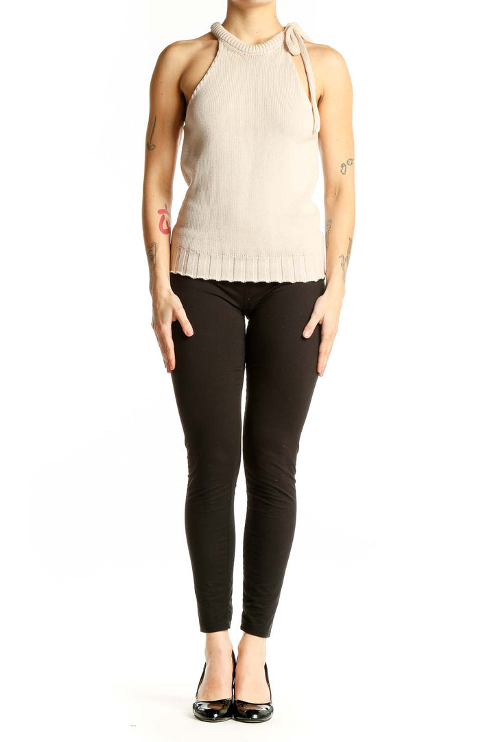 Front view of G. Label beige sleeveless knit top with tie neck detail