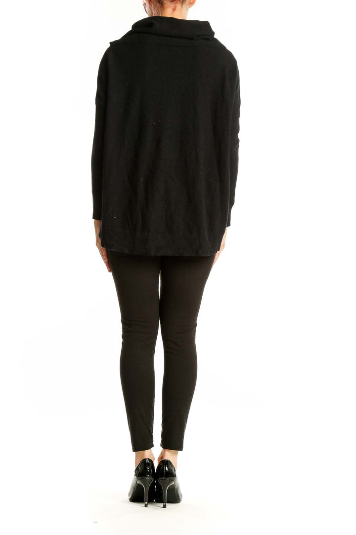Side view of model wearing Joie black cowl neck cashmere blend sweater