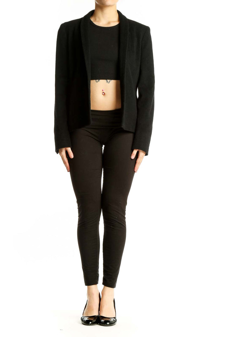Front view of black Louben open-front blazer on model