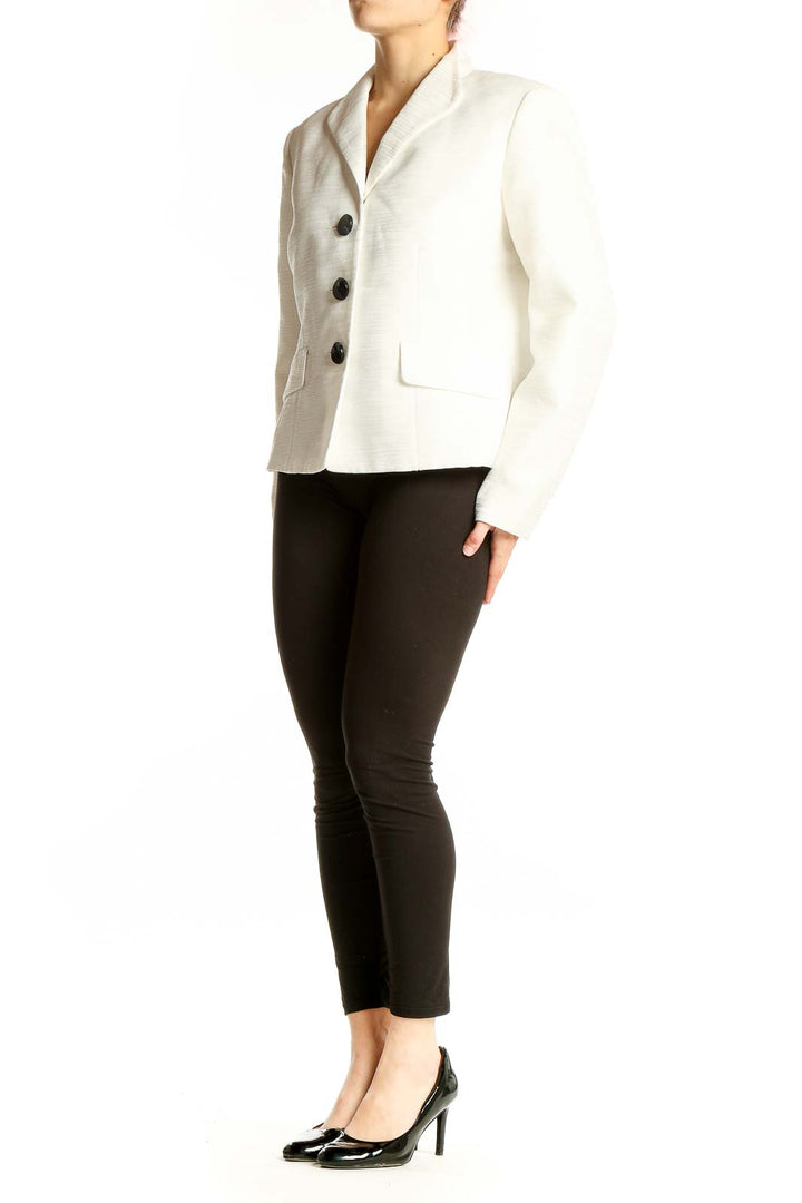 Front view of Jones Studio white polyester blazer with three-button closure