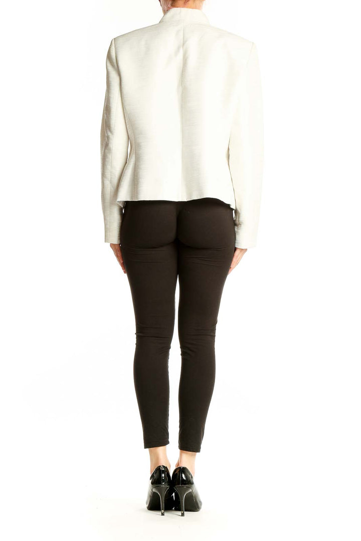 Back view of Jones Studio white polyester blazer showing tailored fit