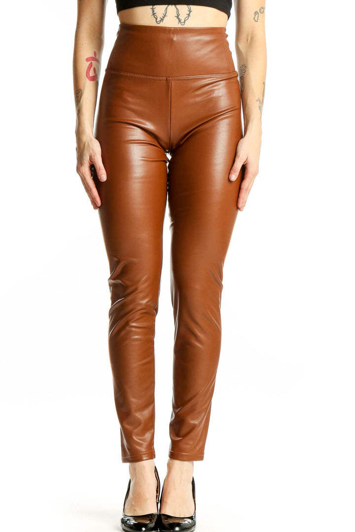 Front view of Bagatelle brown high-waisted faux leather leggings