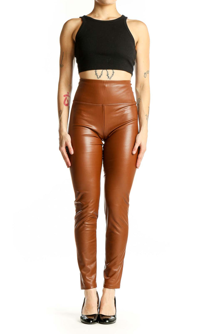 Front view of Bagatelle brown high-waisted faux leather leggings