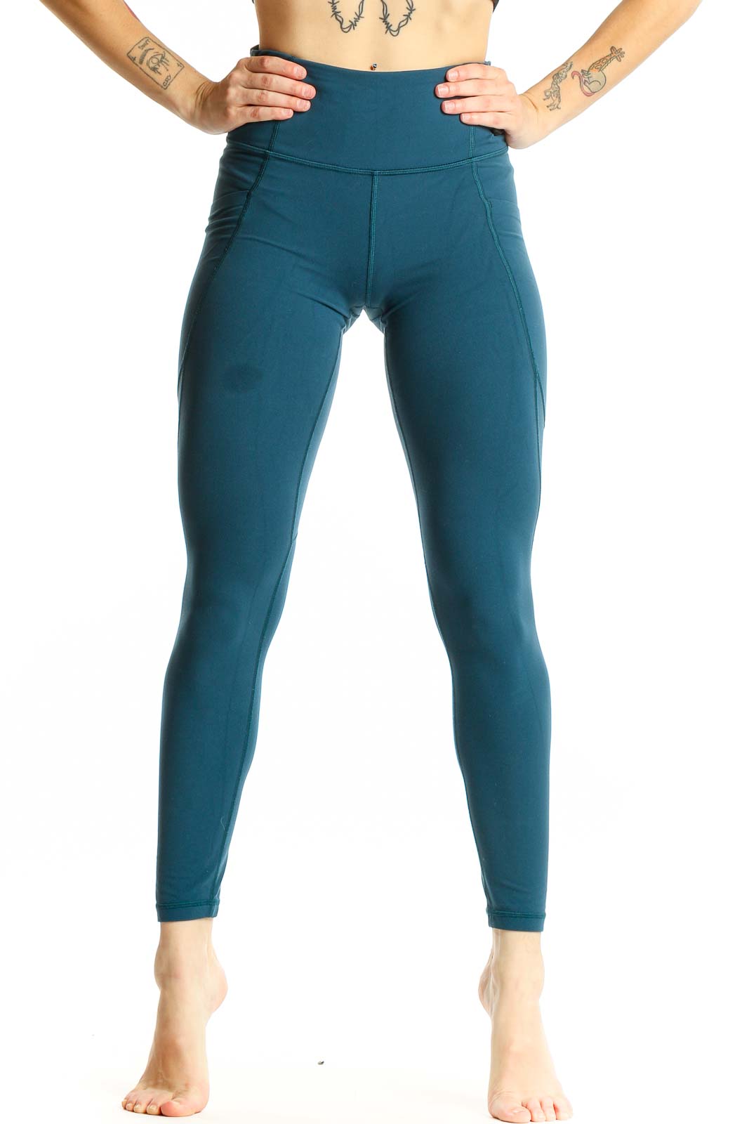 Front view of teal Athleta high-waisted performance leggings