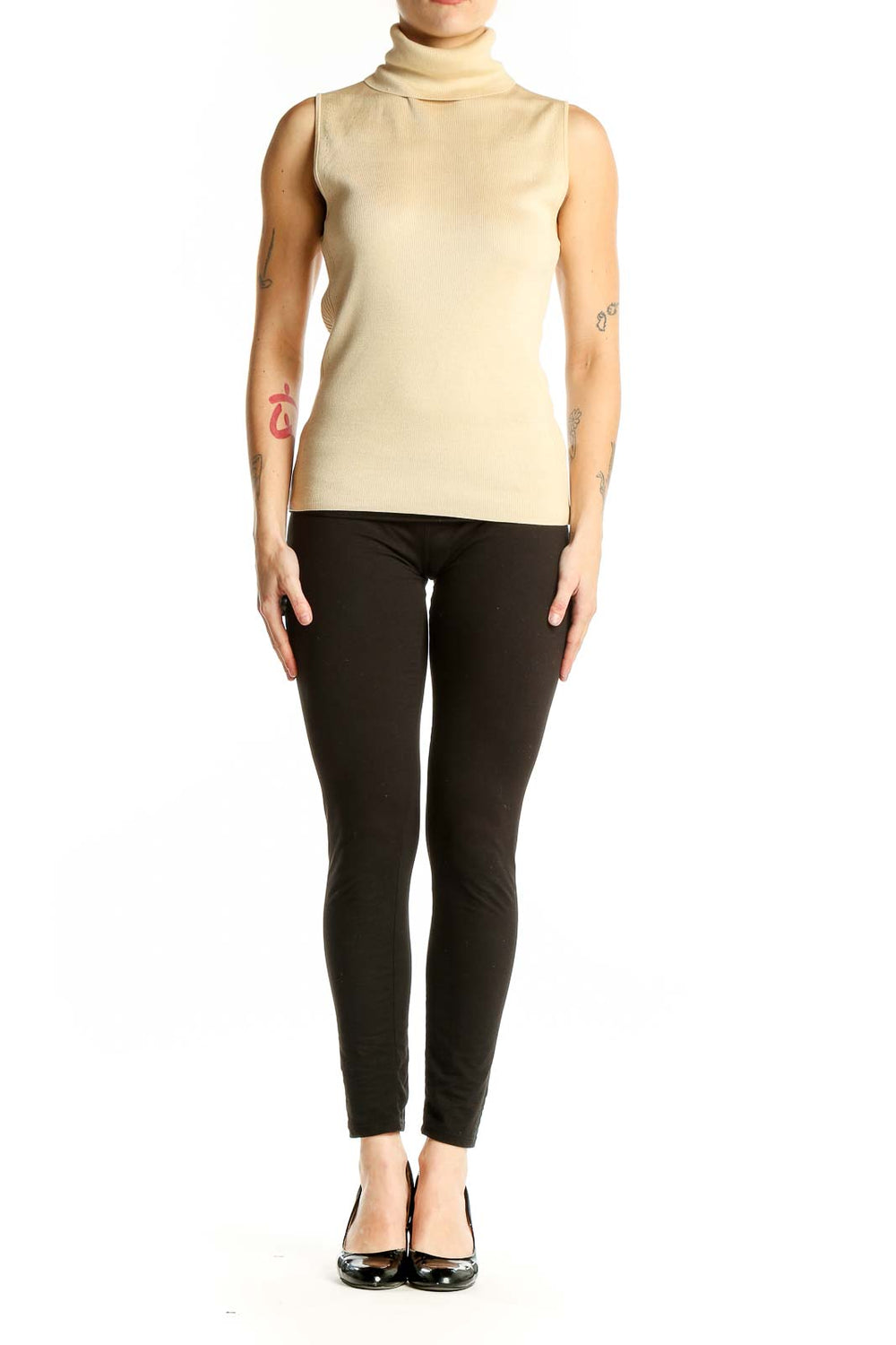 Front view of Ann Taylor cream sleeveless turtleneck knit top