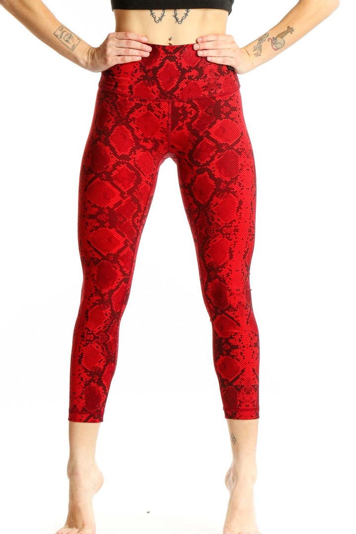 Front view of red snake print Lululemon cropped leggings
