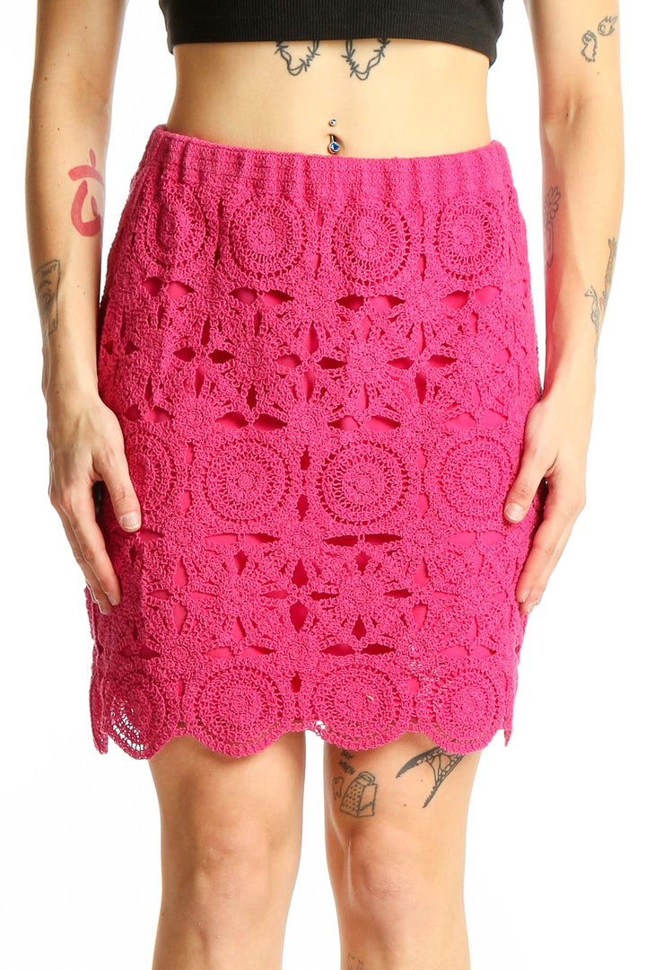 Front view of Caroline Constas hot pink crochet lace pencil skirt with floral pattern