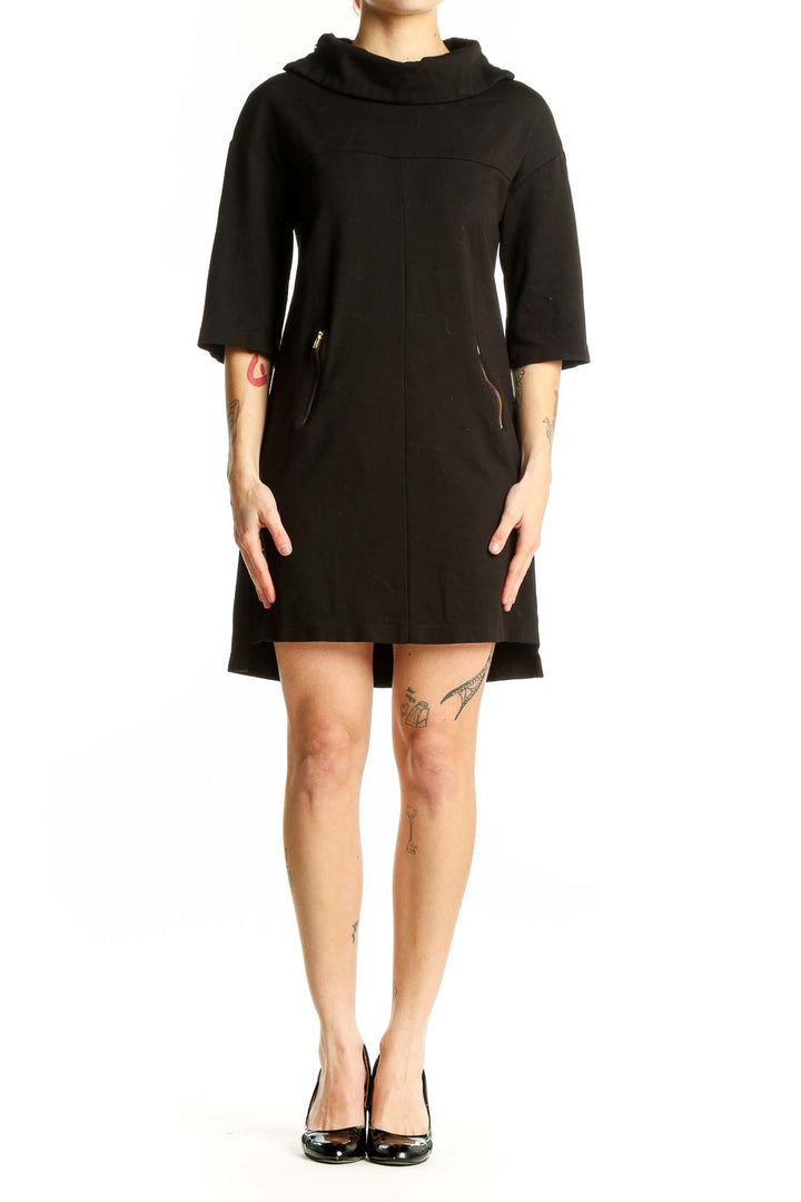 Front view of Komarov black cowl neck shift dress with 3/4 sleeves