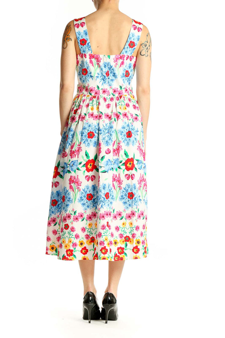 Side view of Maggy London multicolor floral print midi dress showing full skirt
