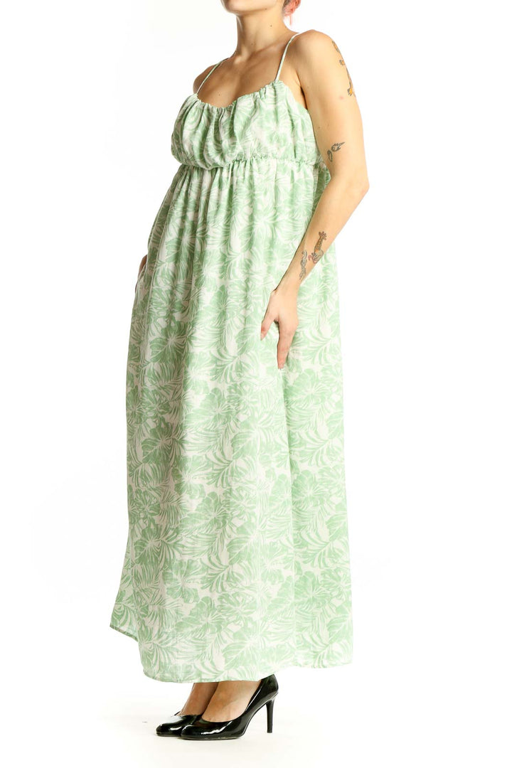 Front view of mint green Gilli maxi dress with white floral print and spaghetti straps