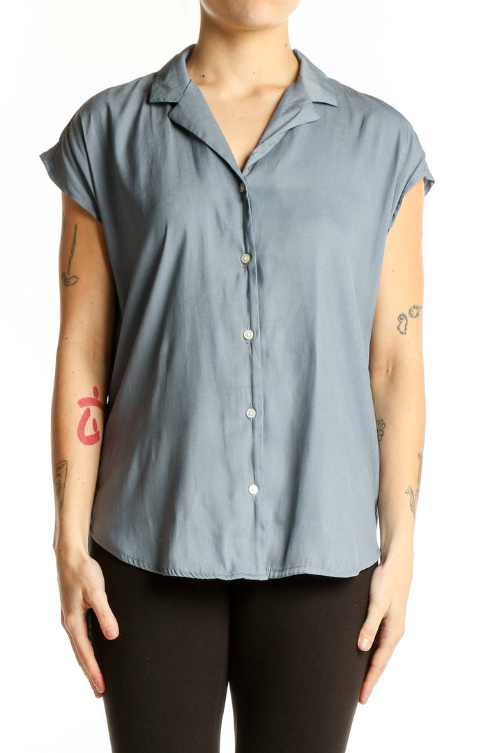 Front view of T Tahari blue polyester short-sleeve button-up blouse