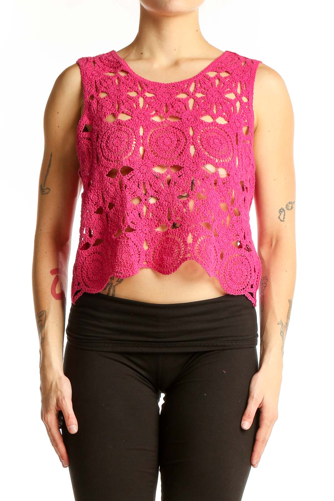 Front view of hot pink crochet lace crop top with floral pattern
