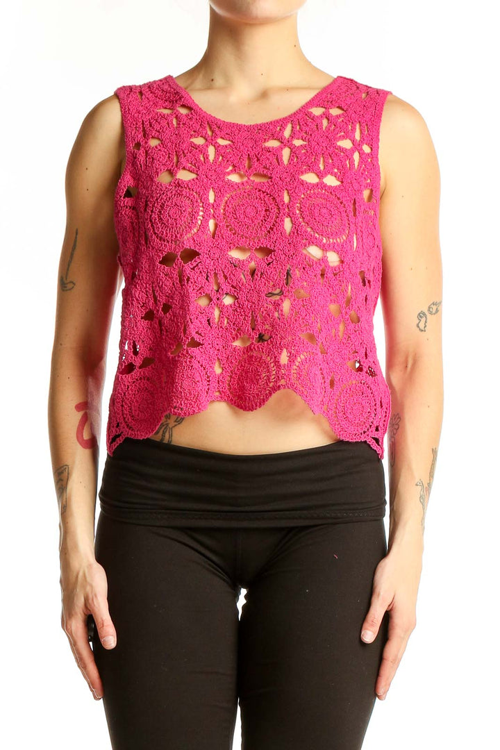 Front view of hot pink crochet lace crop top with floral pattern