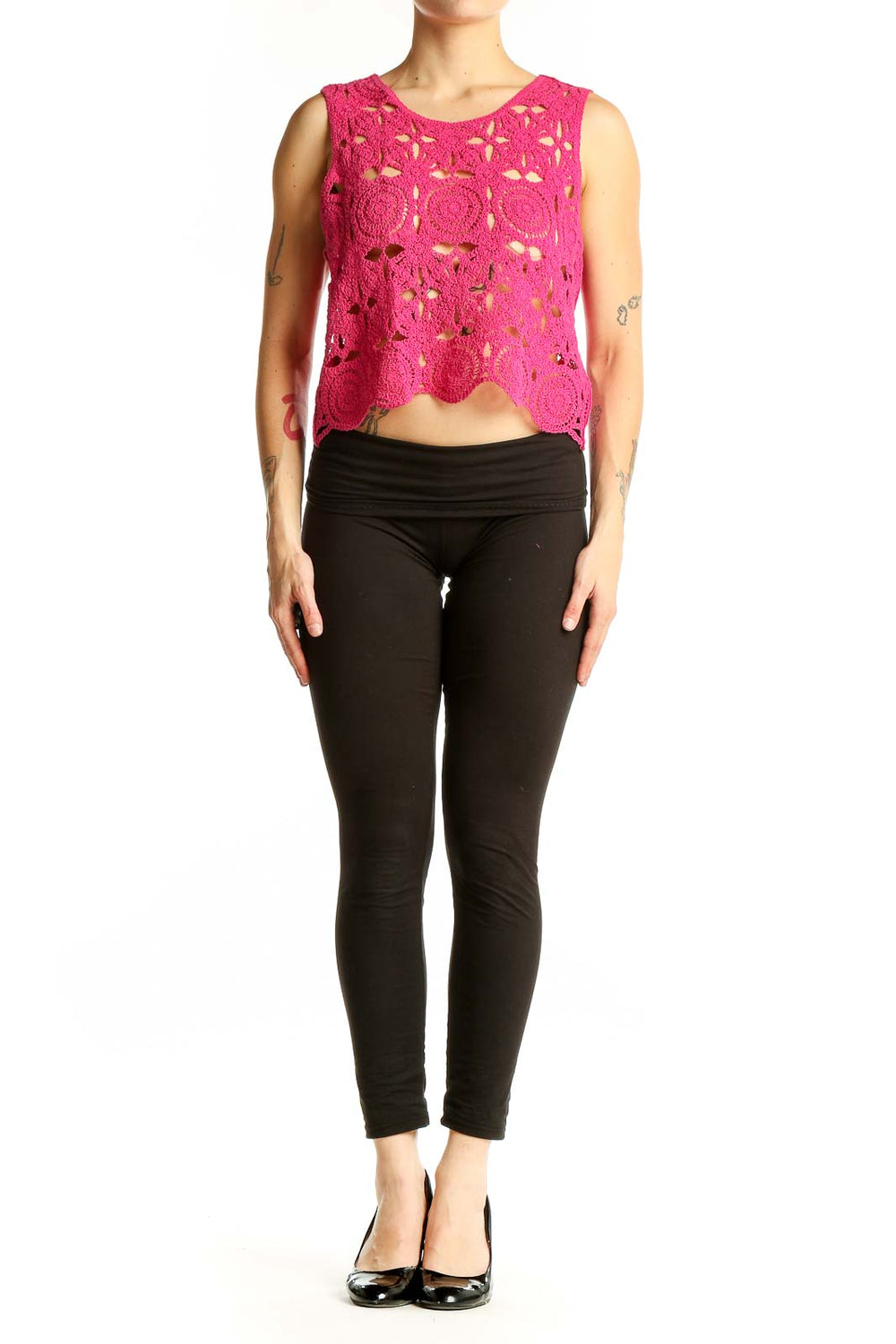 Front view of hot pink crochet lace crop top with floral pattern