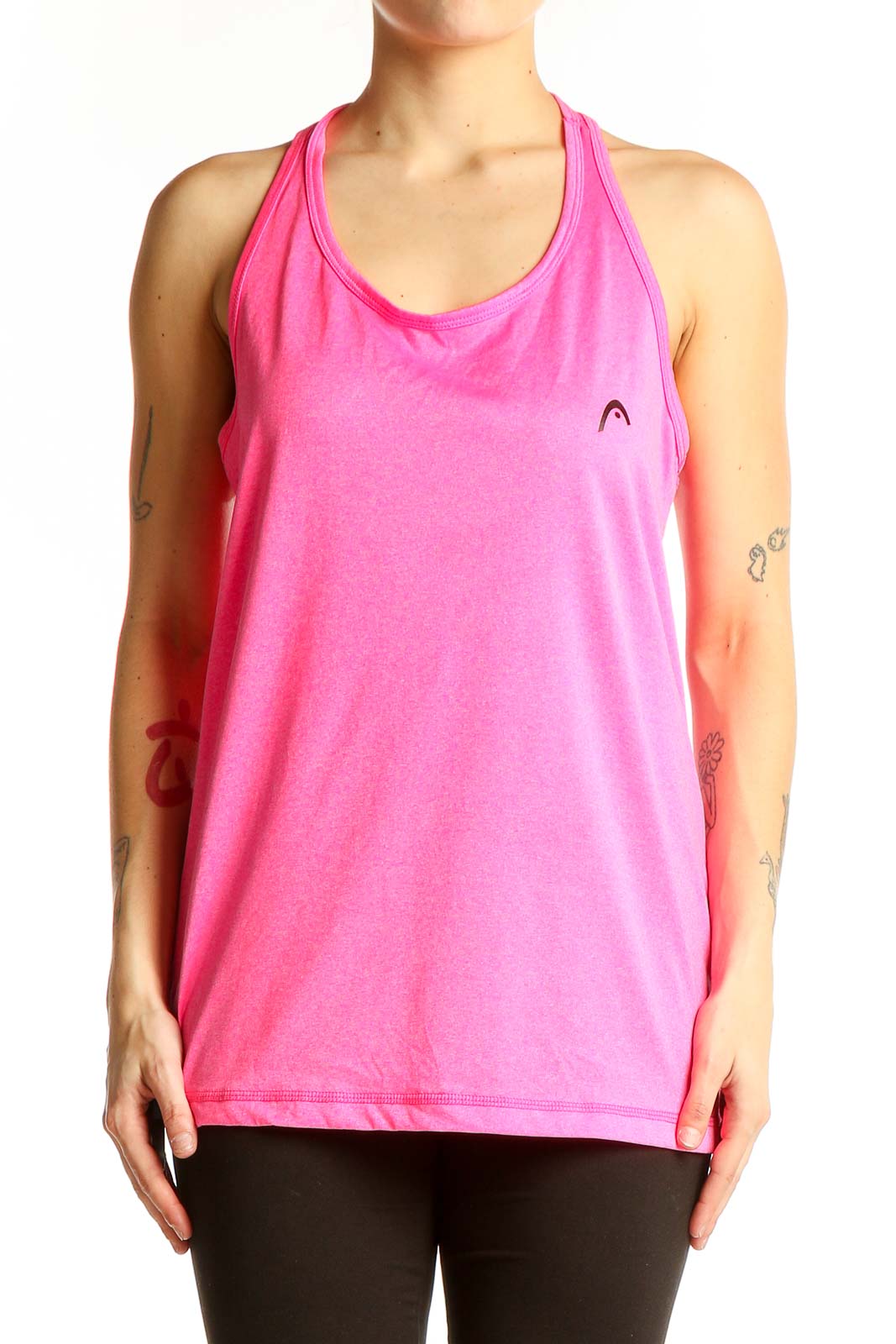 Front view of pink Head racerback tank top on model