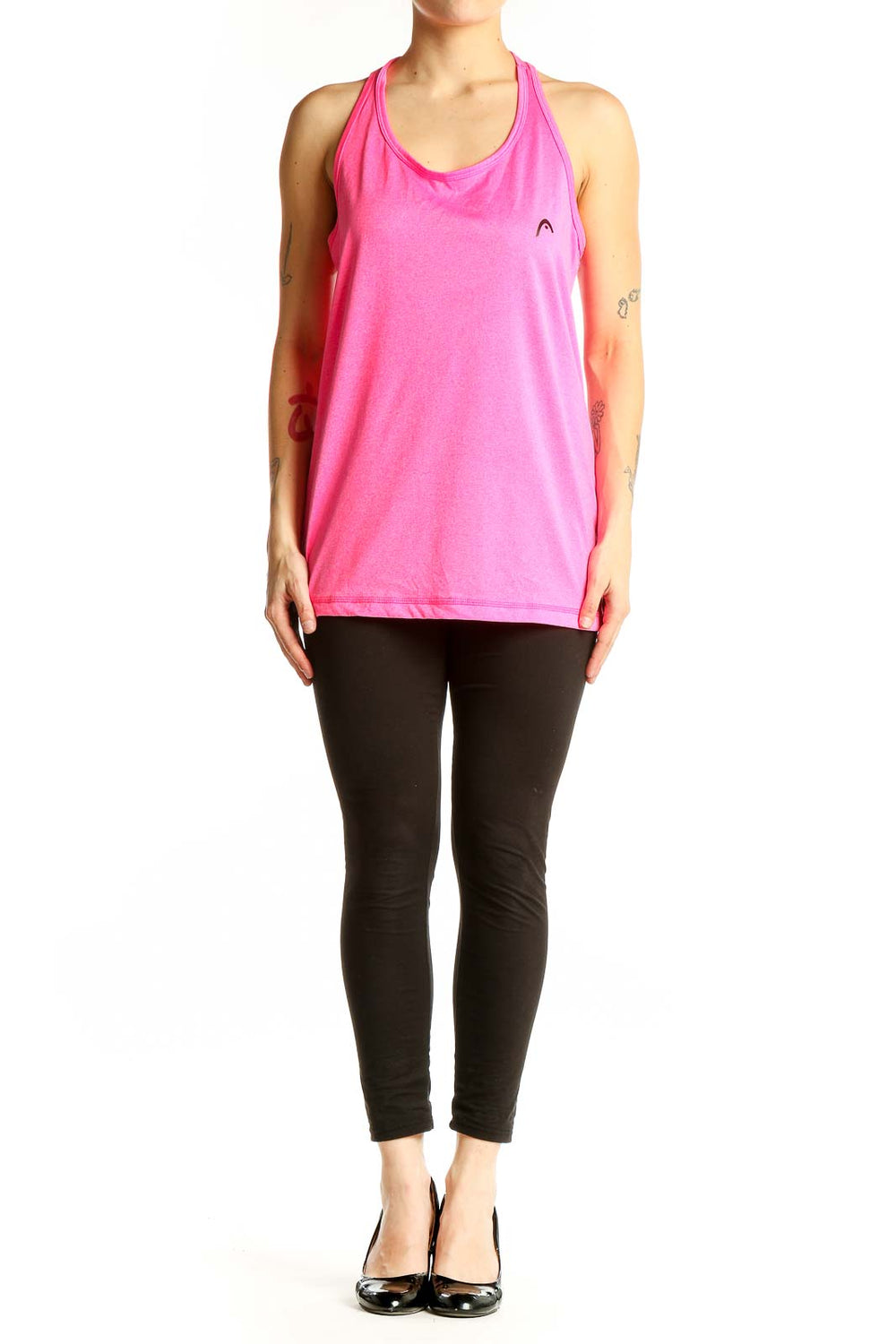Front view of pink Head racerback tank top on model