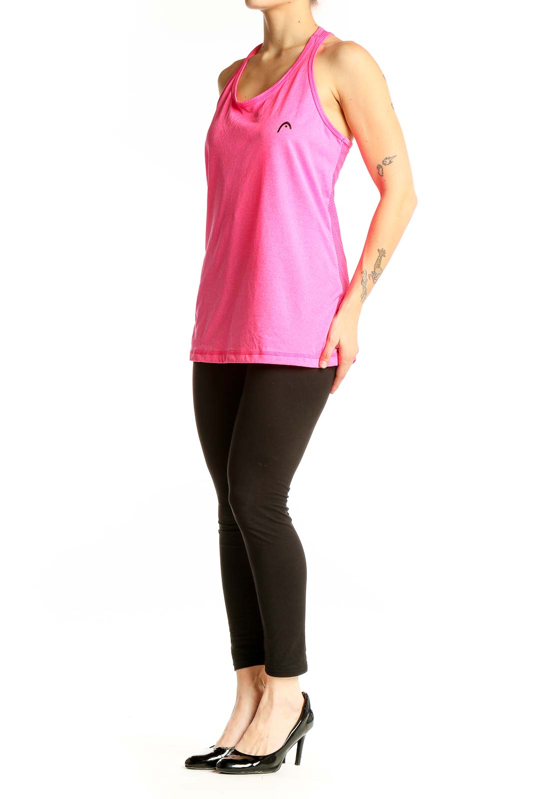 Front view of pink Head racerback tank top on model