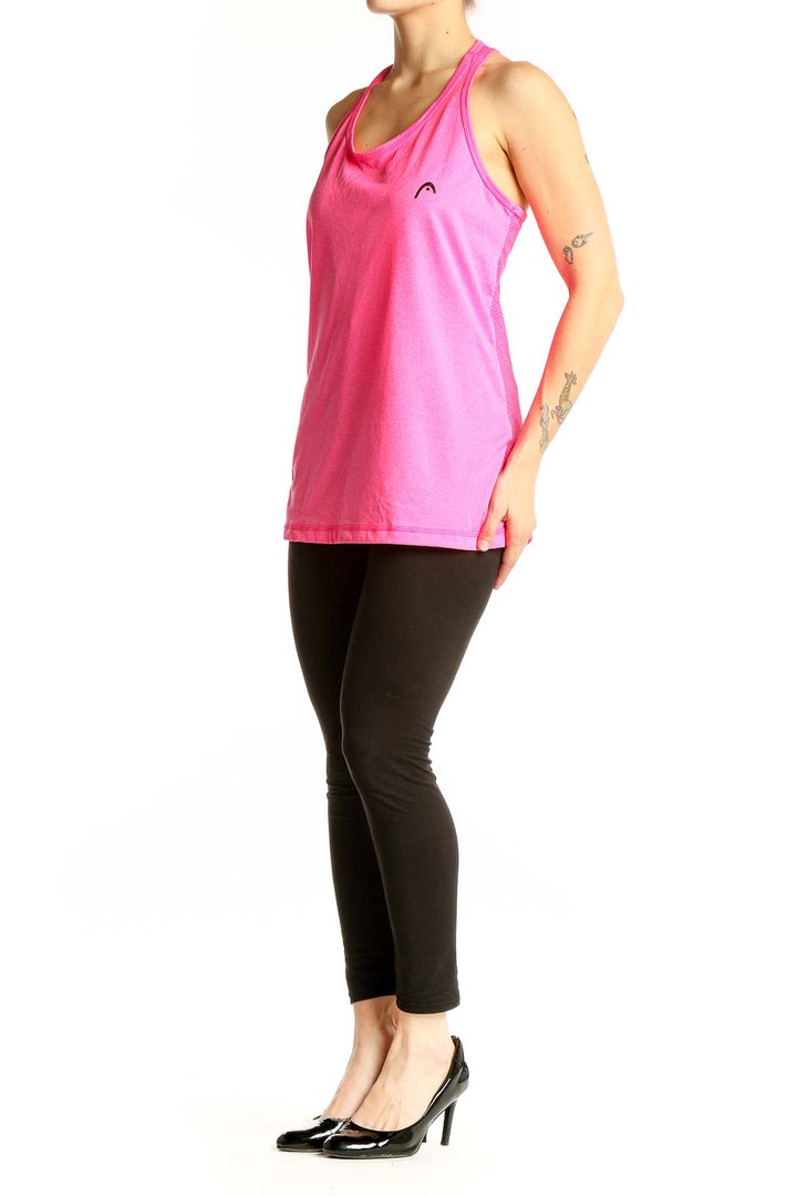 Front view of pink Head racerback tank top on model