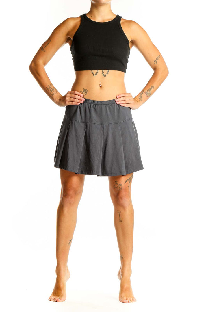 Front view of gray pleated athletic skirt by Bollé