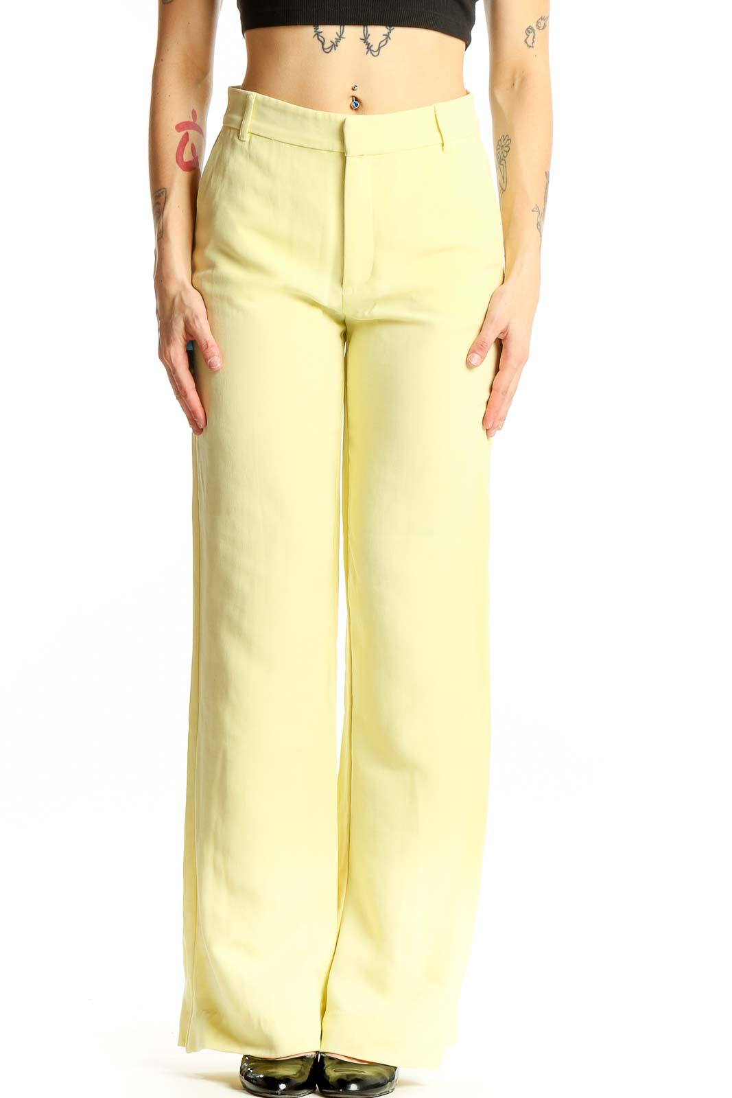 Front view of Zara yellow wide-leg trousers on model